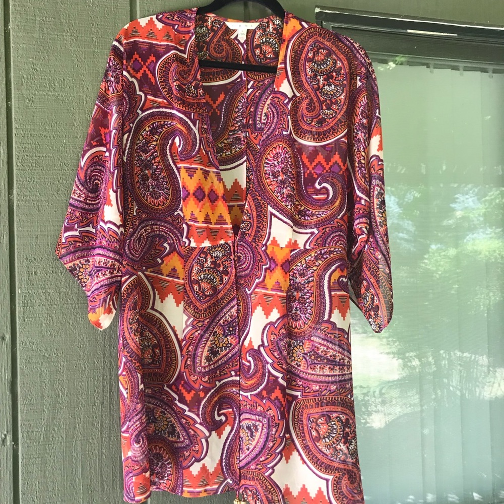 Cabi Flowy sheer tunic tie top.
